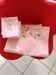 Nappe rose avec couronne de fleurs + 10 serviettes