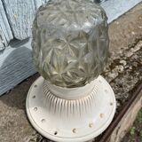 Art Deco ceiling light with a porcelain base.