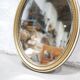 Old oval mirror Louis XVI style in gilded wood 50cm x 34cm
