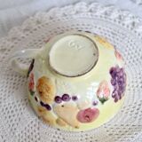 Large vintage earthenware mug with fruit motif and slip details