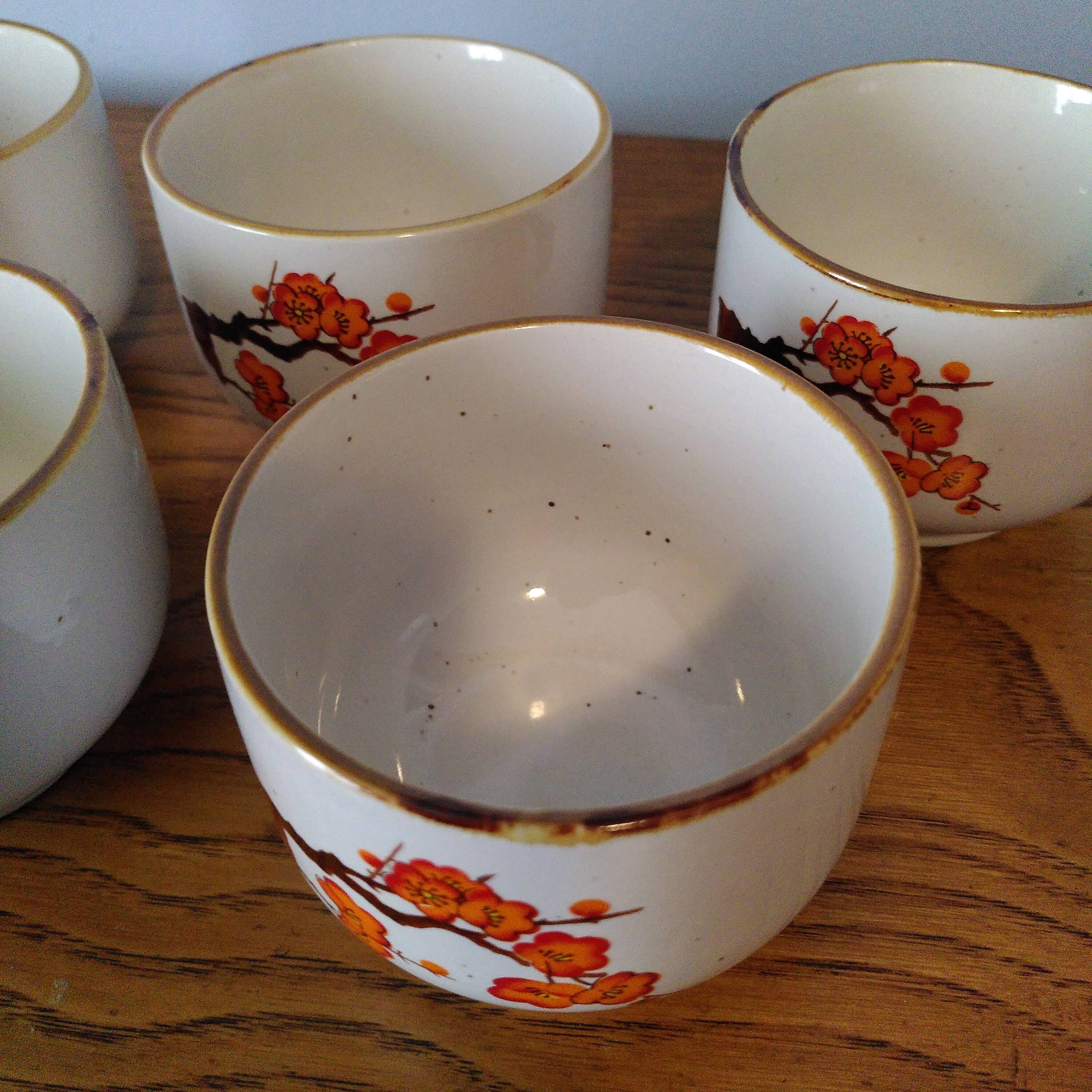 Orange flower tea cups
