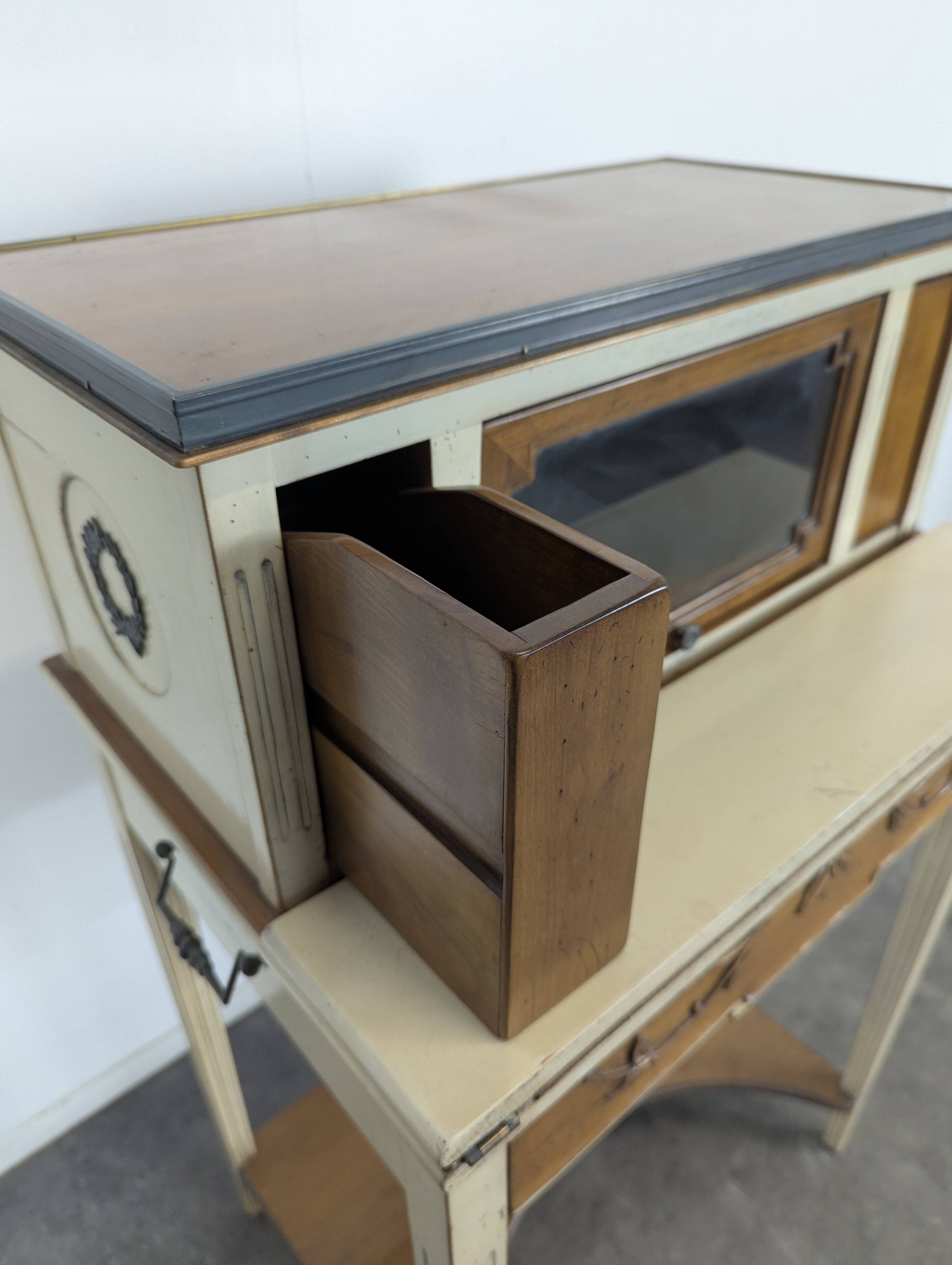 Lady Bonheur's desk, cerused and neo-rustic with highlights.