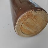 Bottle in varnished sandstone