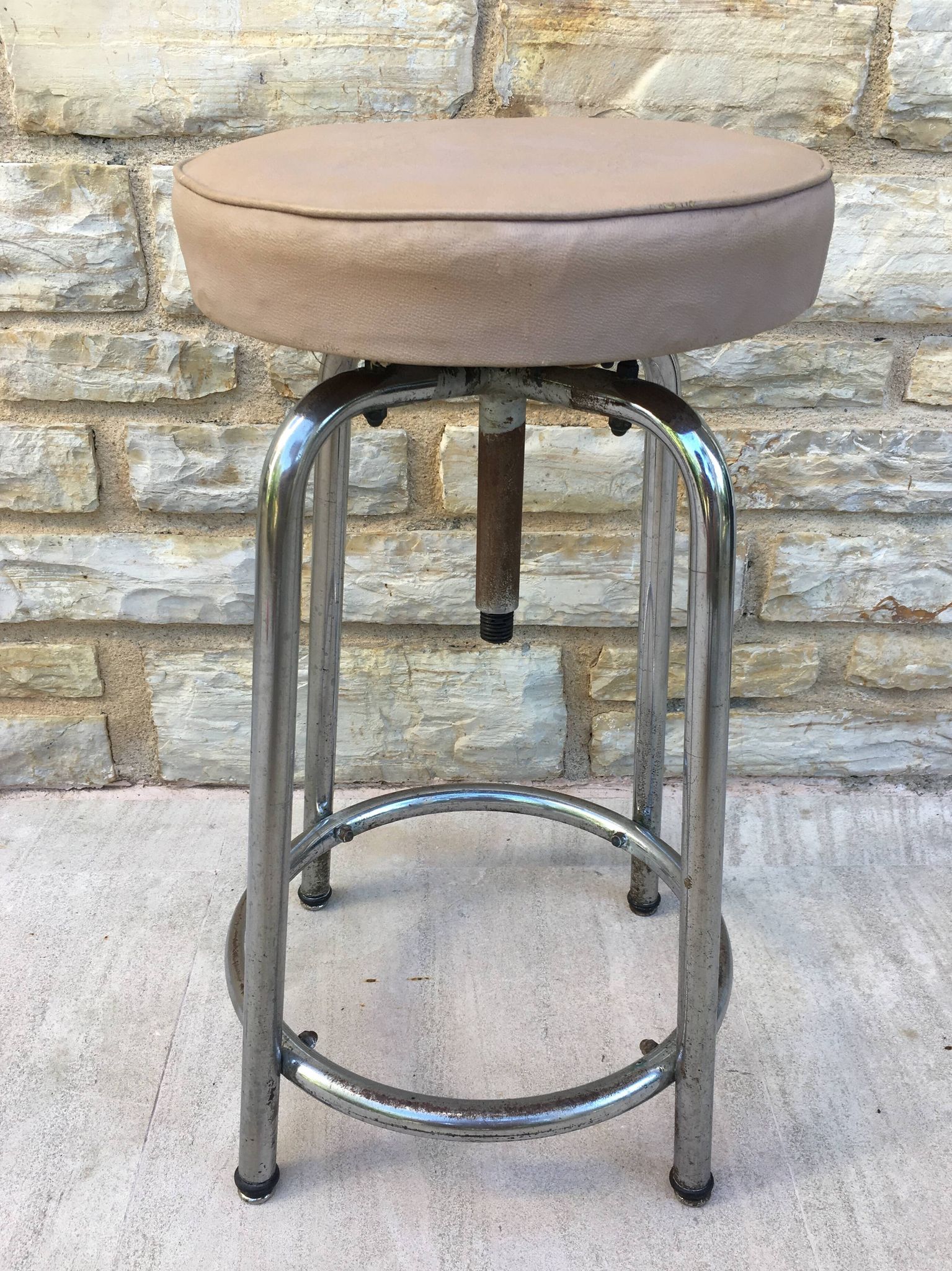 Modernist stool circa 1930 in the style of LC7 by Perriand, Le Corbusier and Jeanneret