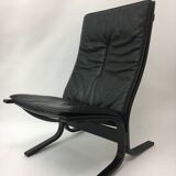 Mid-Century design black leather lounge chair by Ingmar Relling for Westnof