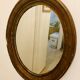 Old art deco oval wooden mirror