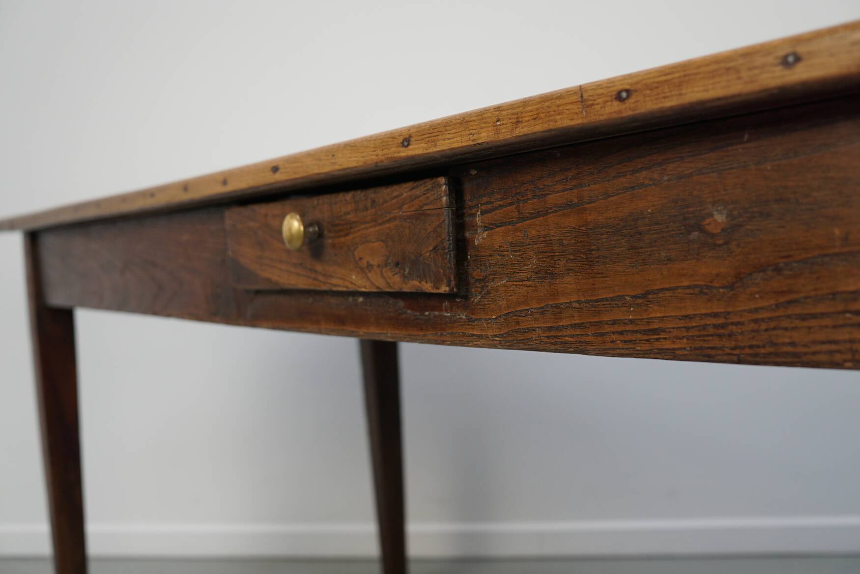 Large rustic farmhouse dining table from the French 19th century, in old elm