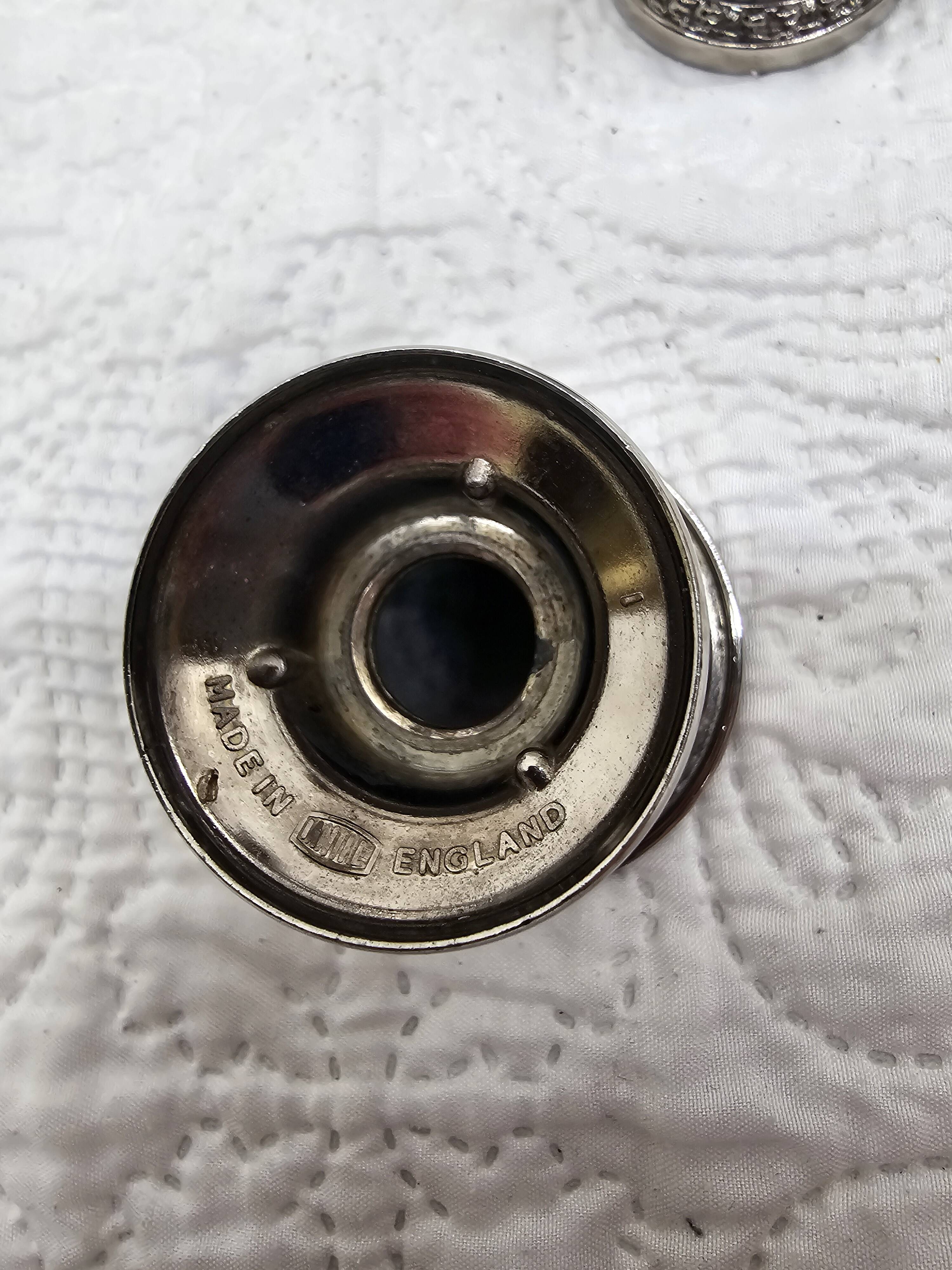 Silver-plated salt and pepper shakers and egg cups