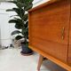 Sideboard with compass feet