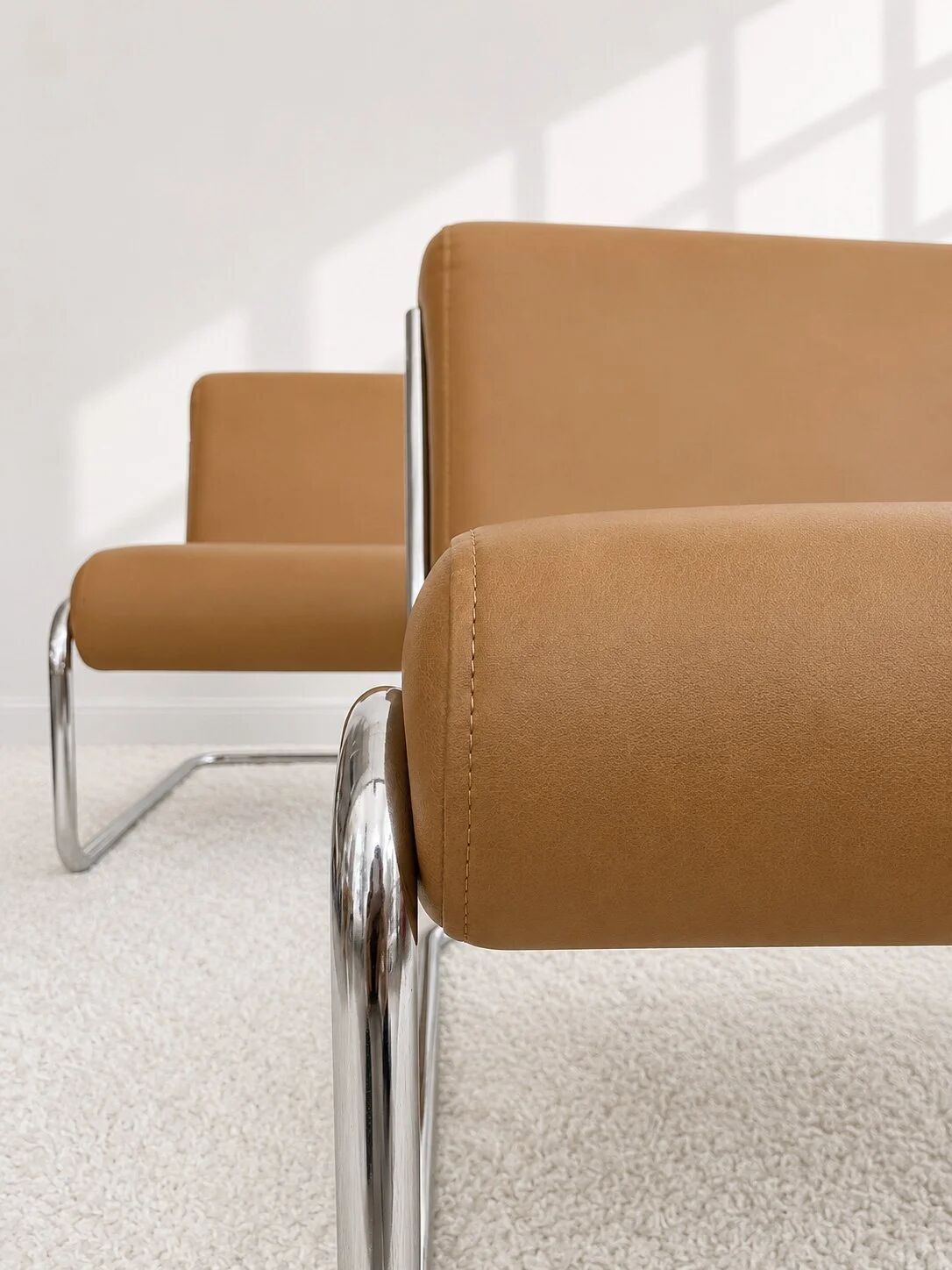 Vintage cantilever armchair. Brown faux leather upholstery. 60s