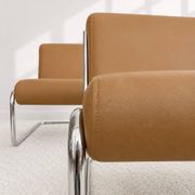 Vintage cantilever armchair. Brown faux leather upholstery. 60s