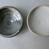 2 enameled stoneware cups, one of which is signed