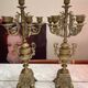 Fireplace trim clock and adornment of antique bronze candelabra