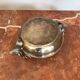Empty silver metal pocket with deer heads