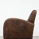 Fauteuil en cuir de mouton élégant et stylé avec un design épuré.