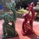 Pair of Art Deco deer by Charles Lemanceau in red and green ceramic.