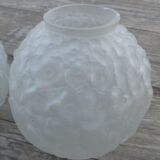 Art Deco ball vase pair with flower and leaf decor