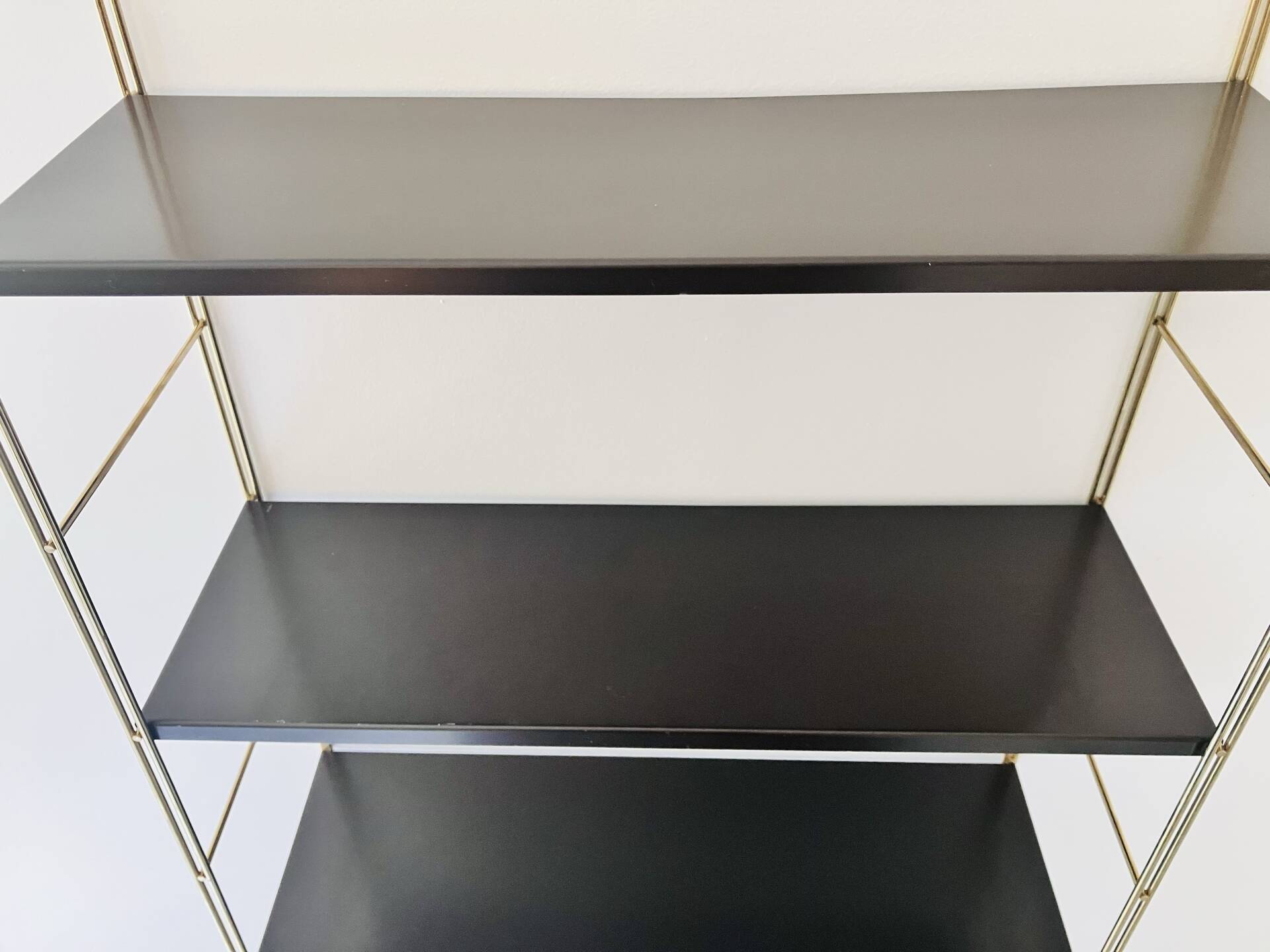 Gold and brown String wall shelves
