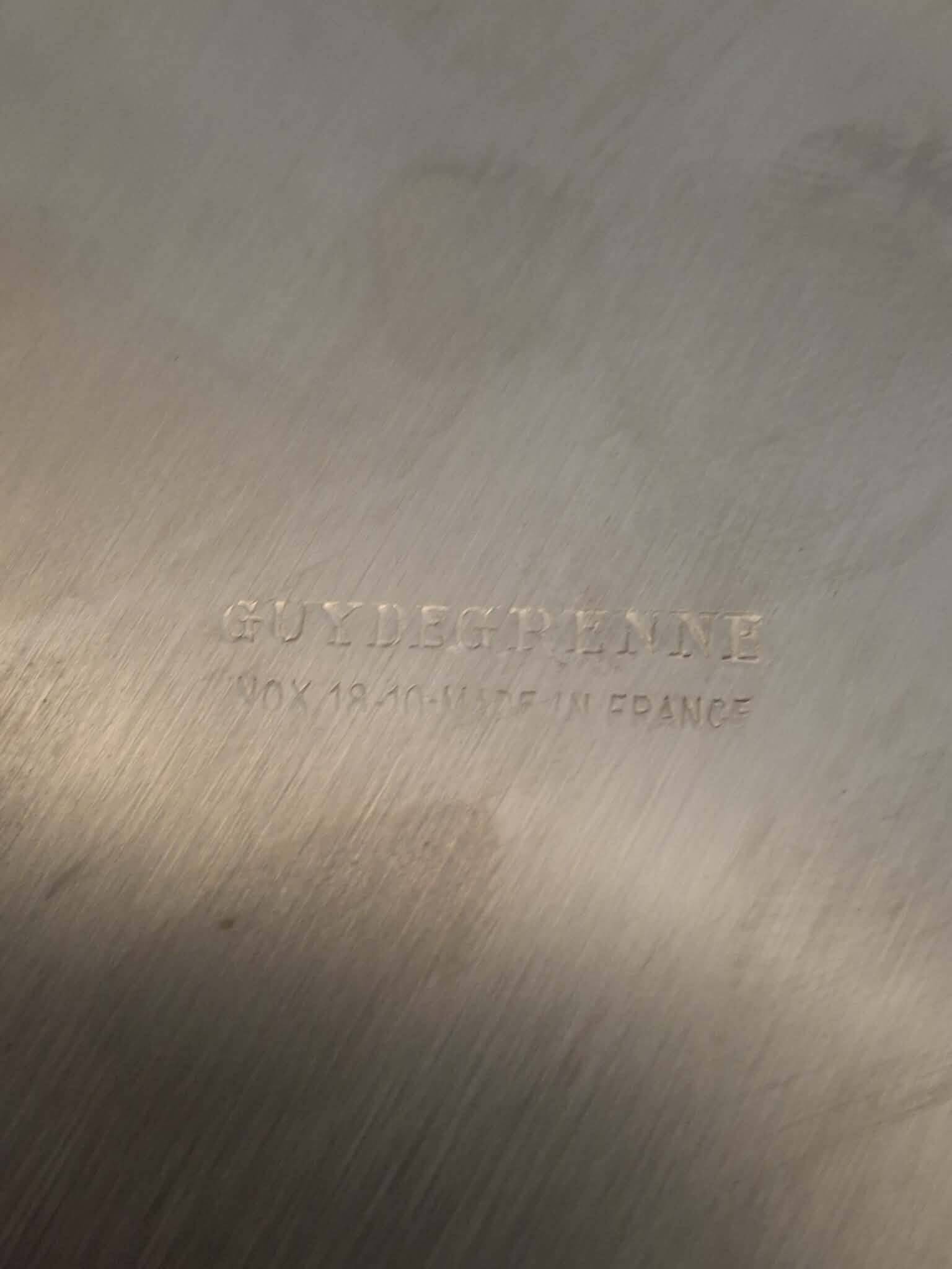 Elegant stainless steel champagne bucket signed by Guy Degrenne, made in France.