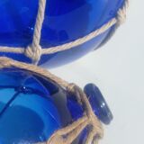 Two blue trawler balls