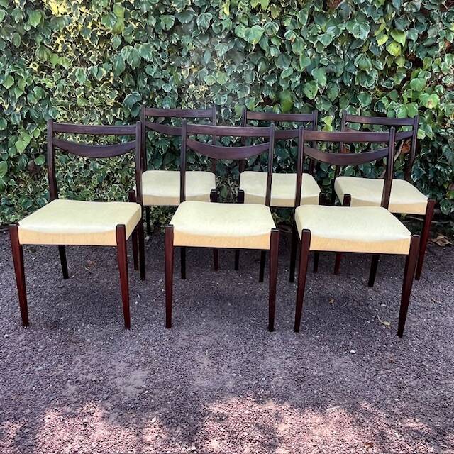 6 Scandinavian chairs with pale yellow skai seats