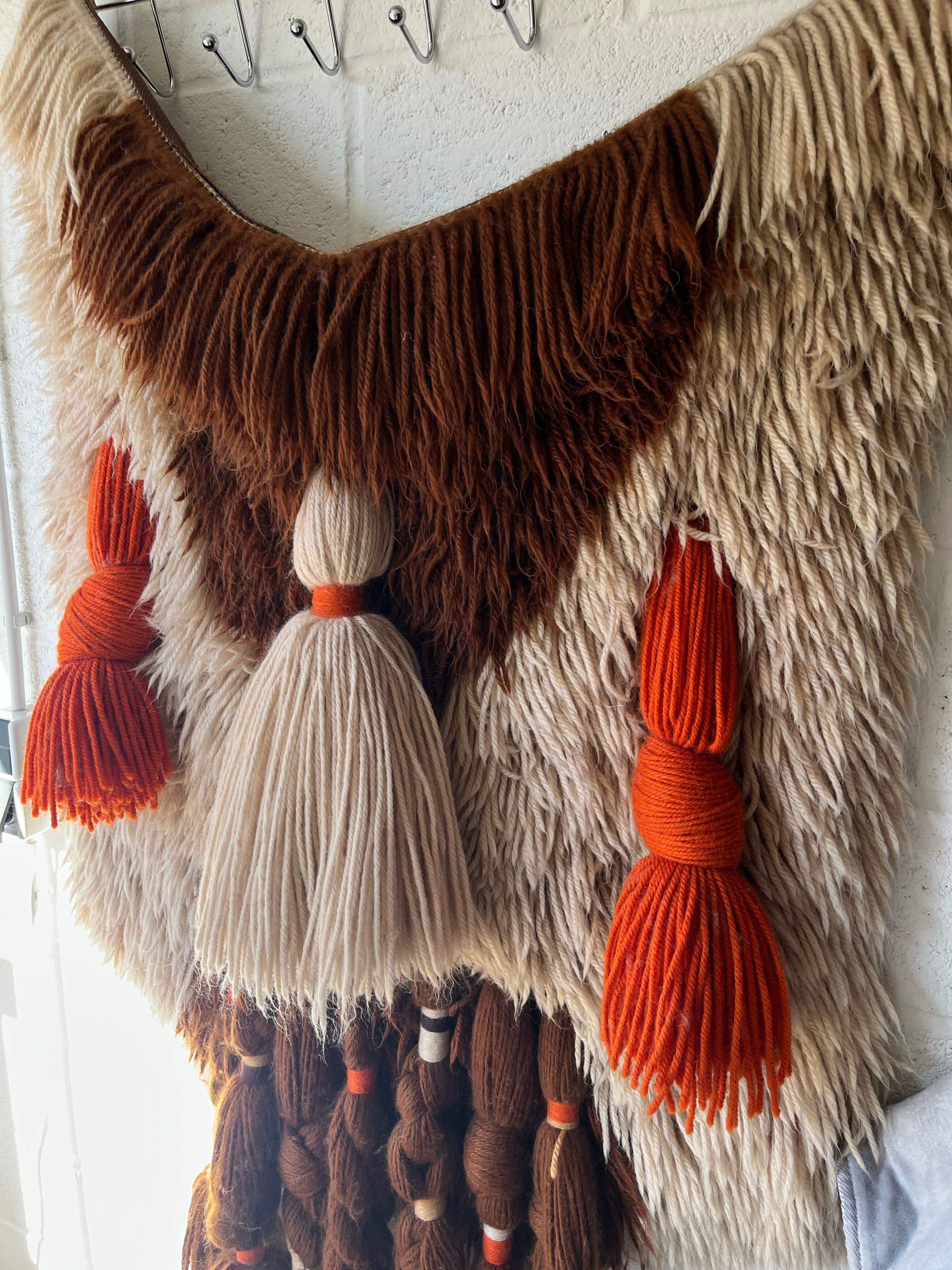 Handmade woven wool wall tapestry from the 70s and 80s, vintage macramé.