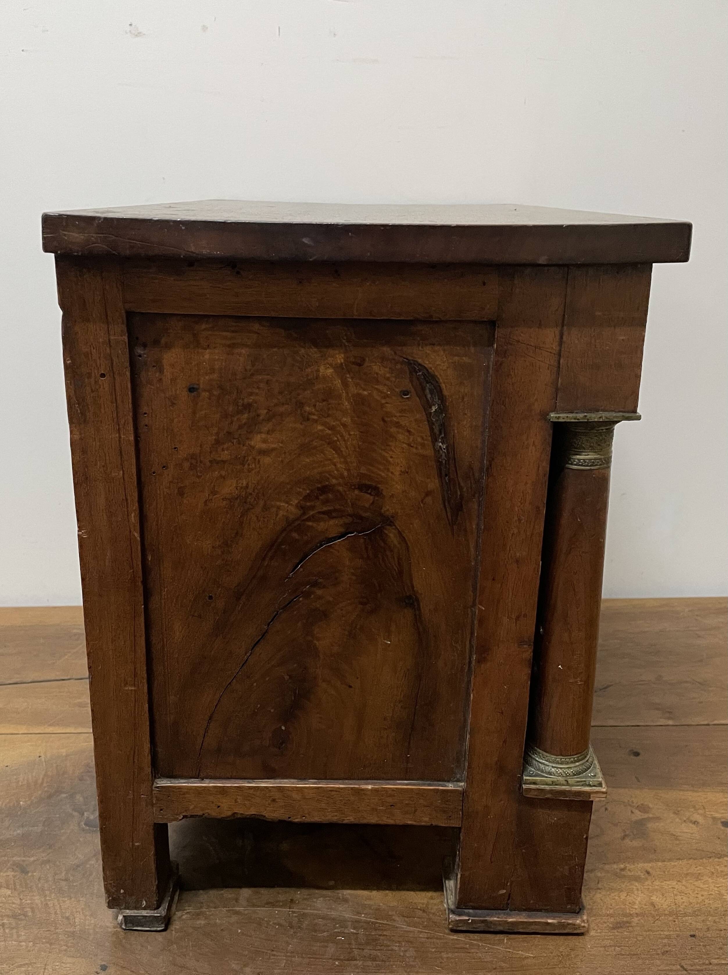 19th century Empire style walnut chest of drawers. It opens with 3 drawers in