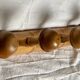 Wall-mounted coat rack with 5 turned wooden hooks