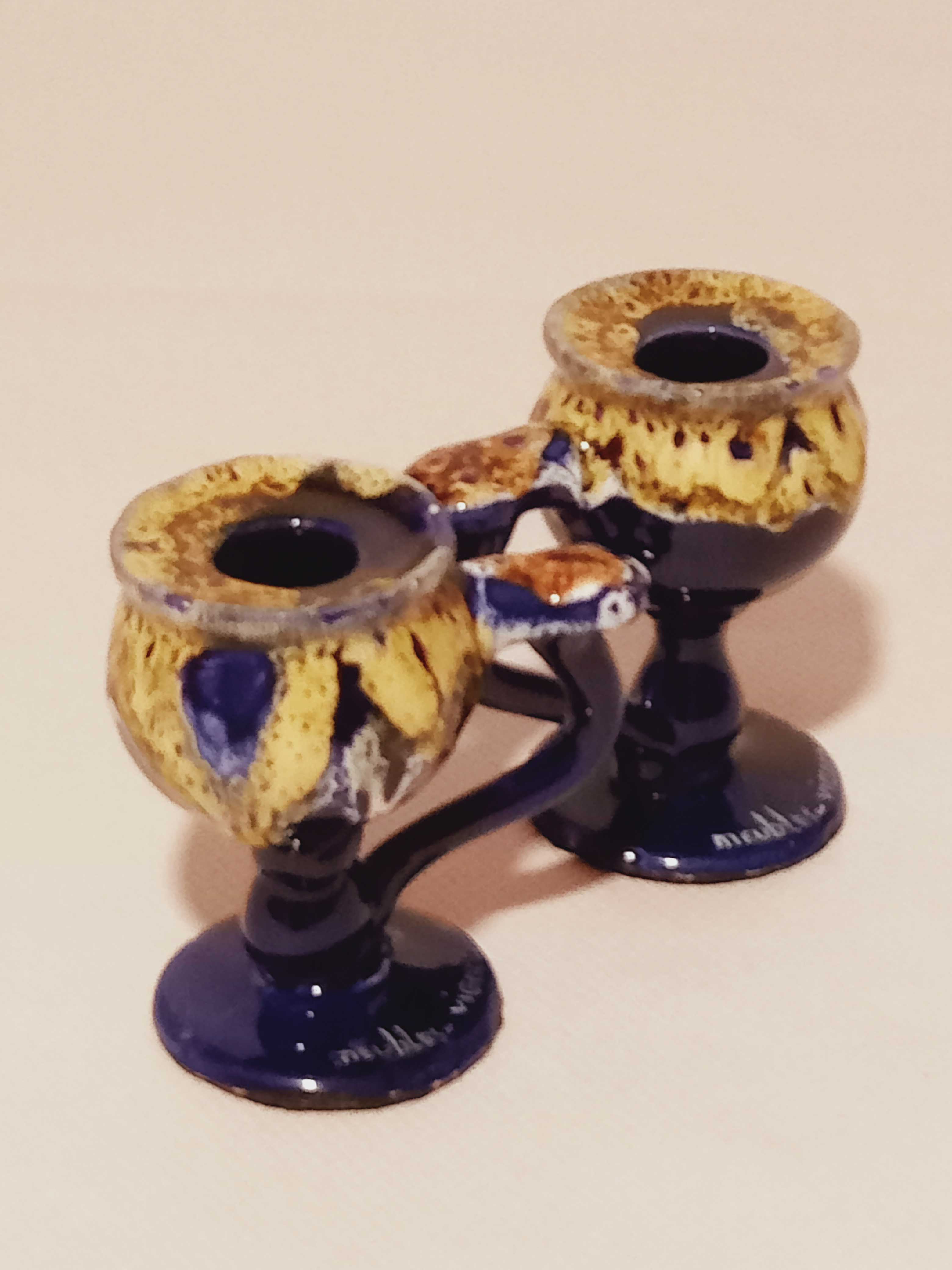 Pair of ceramic candle holders