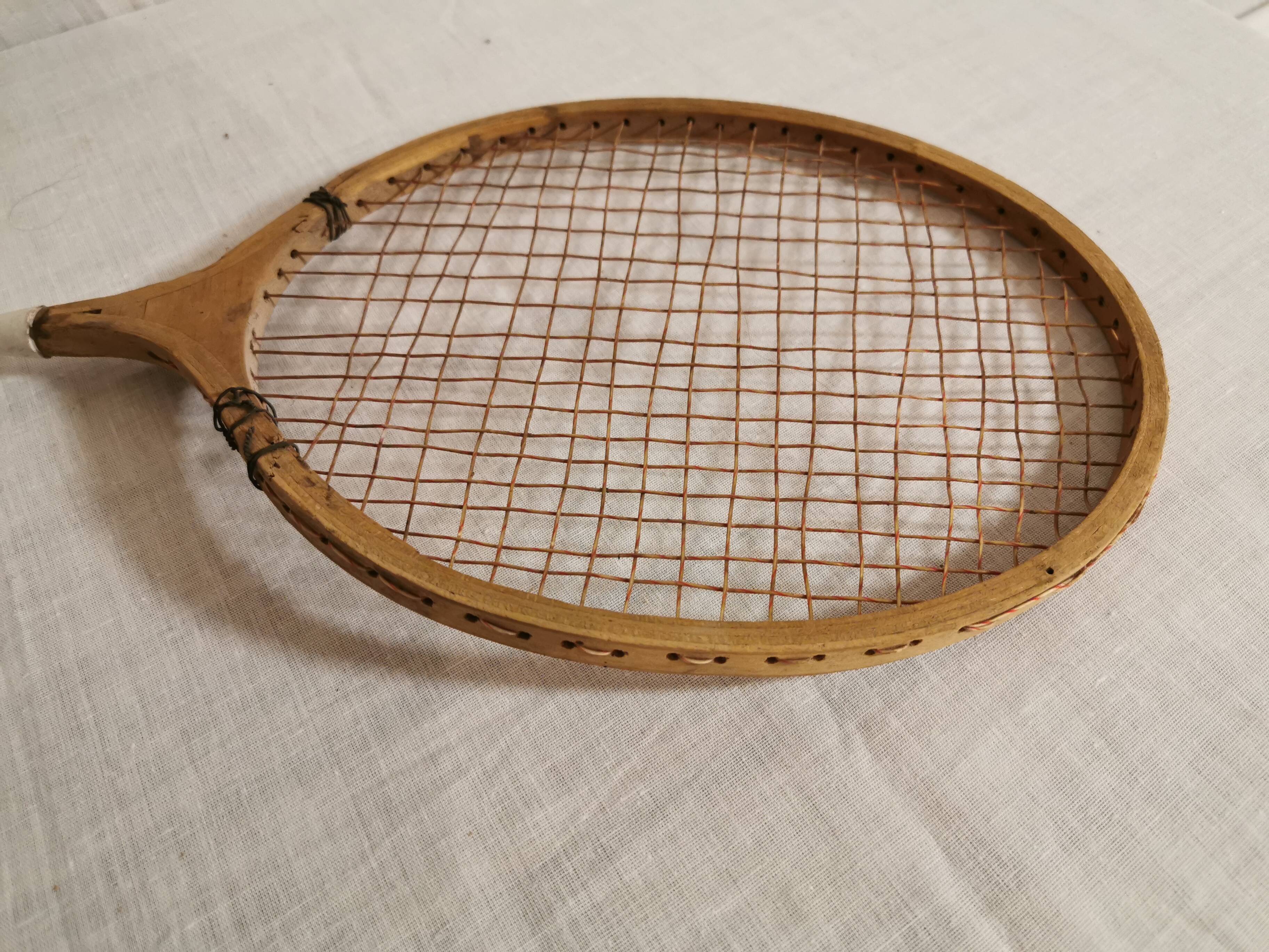 Old tennis racket early 20th in wood