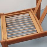 1970s chair in oak and orange cushions