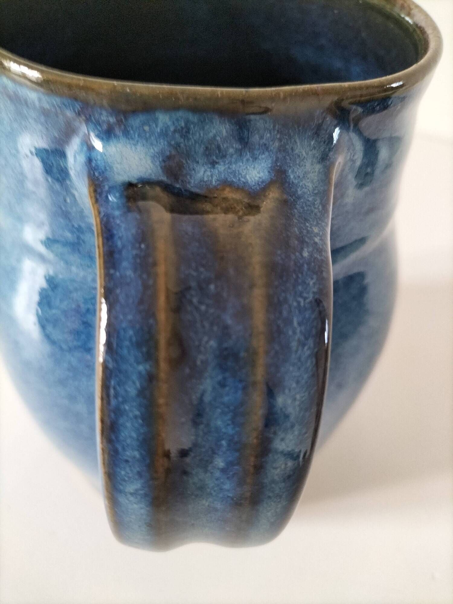 Blue glazed stoneware jug