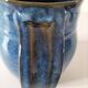 Blue glazed stoneware jug
