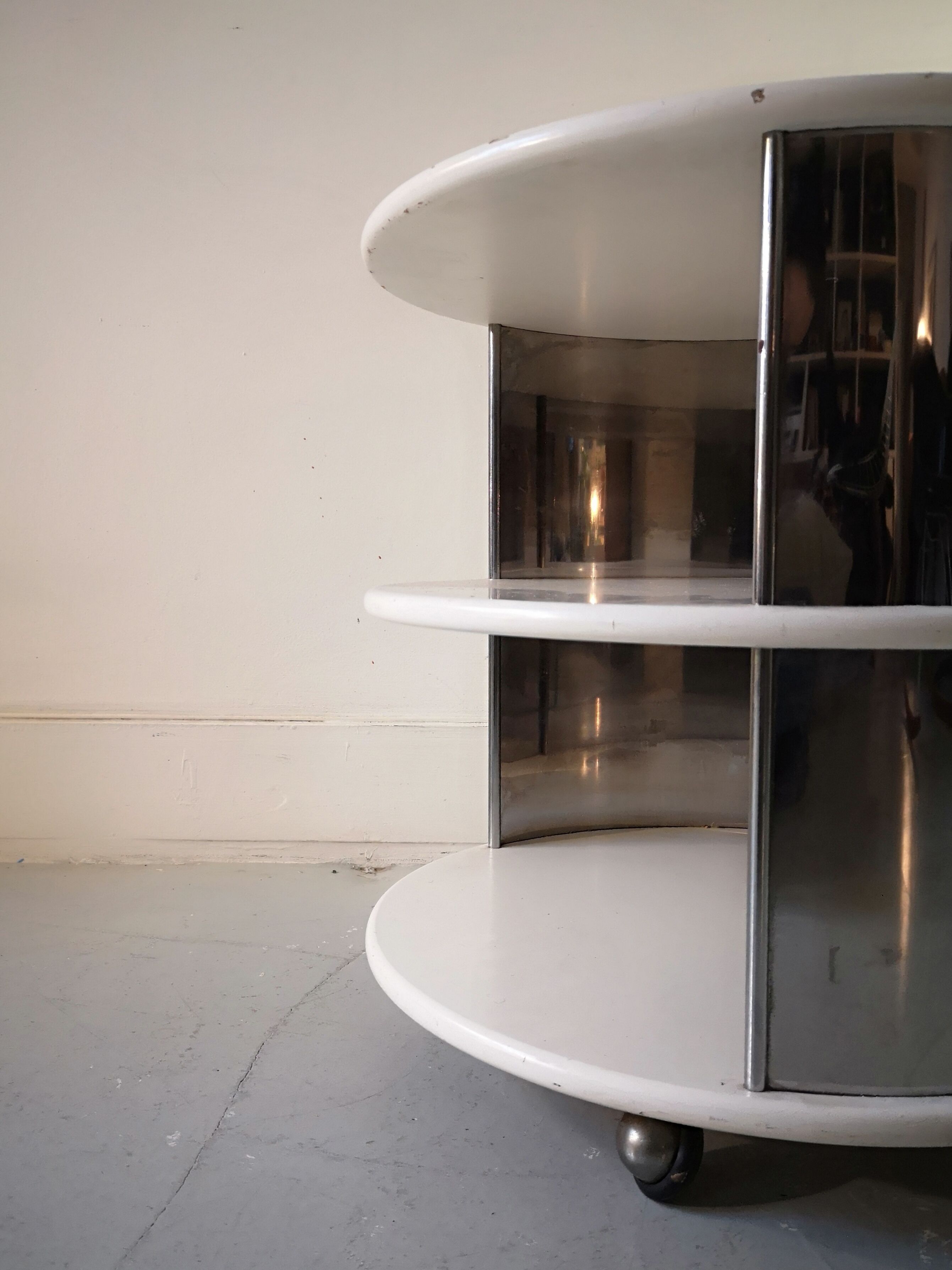 Pair of mirrored space age cylindrical bedside tables, 1960