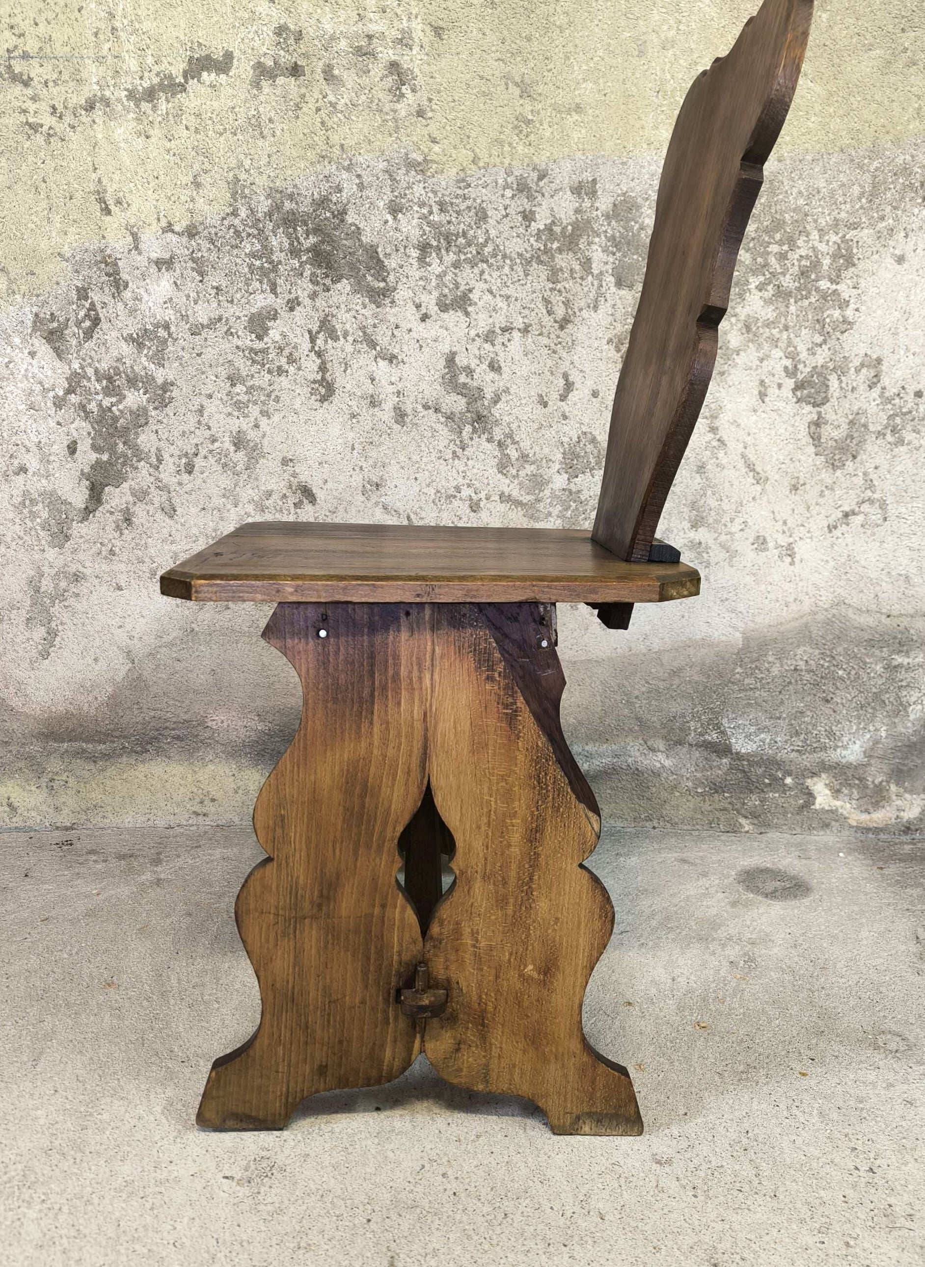 Set of six vintage brutalist wooden chairs.