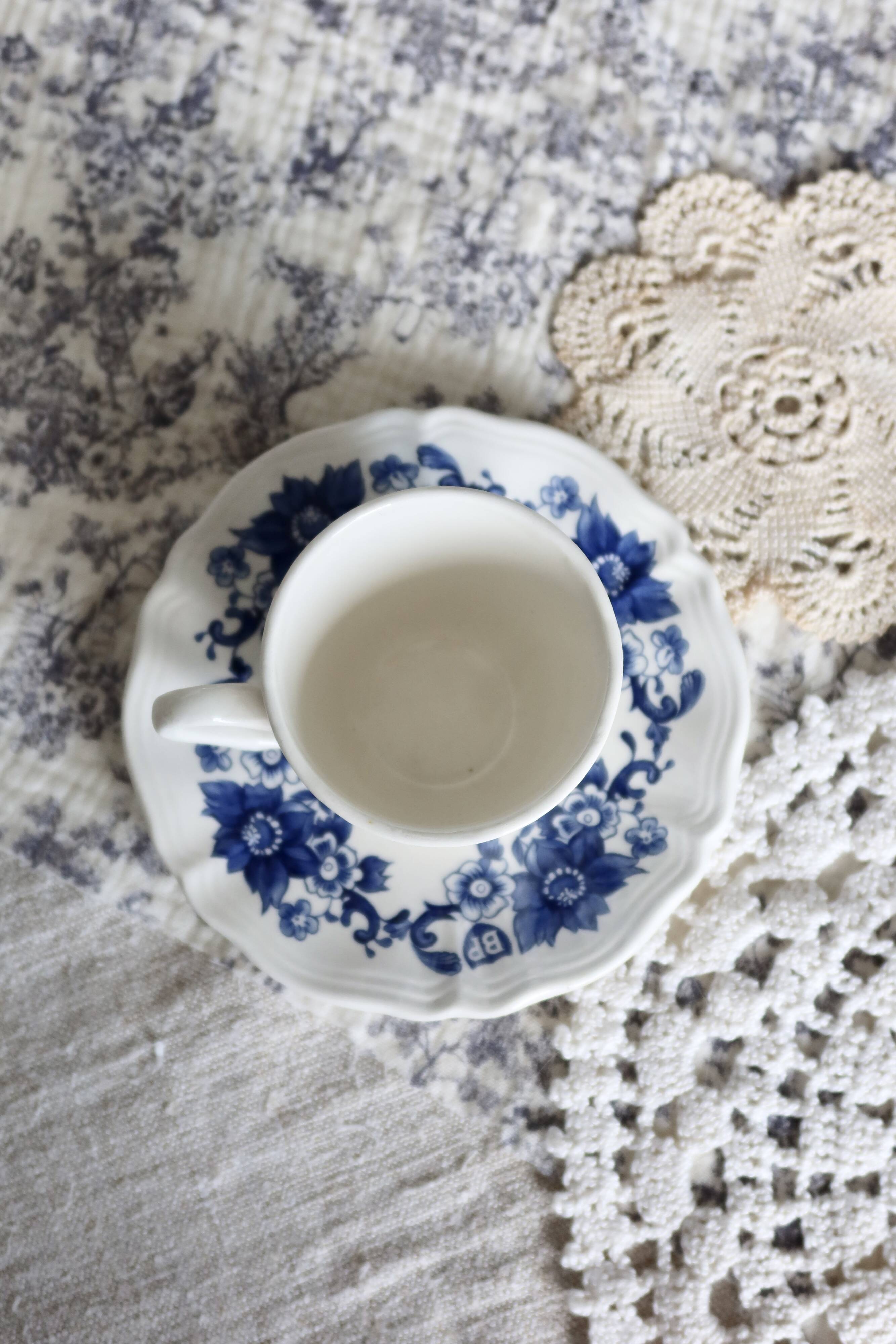 Vintage Sarreguemines cup & saucer – White earthenware with blue floral decoration