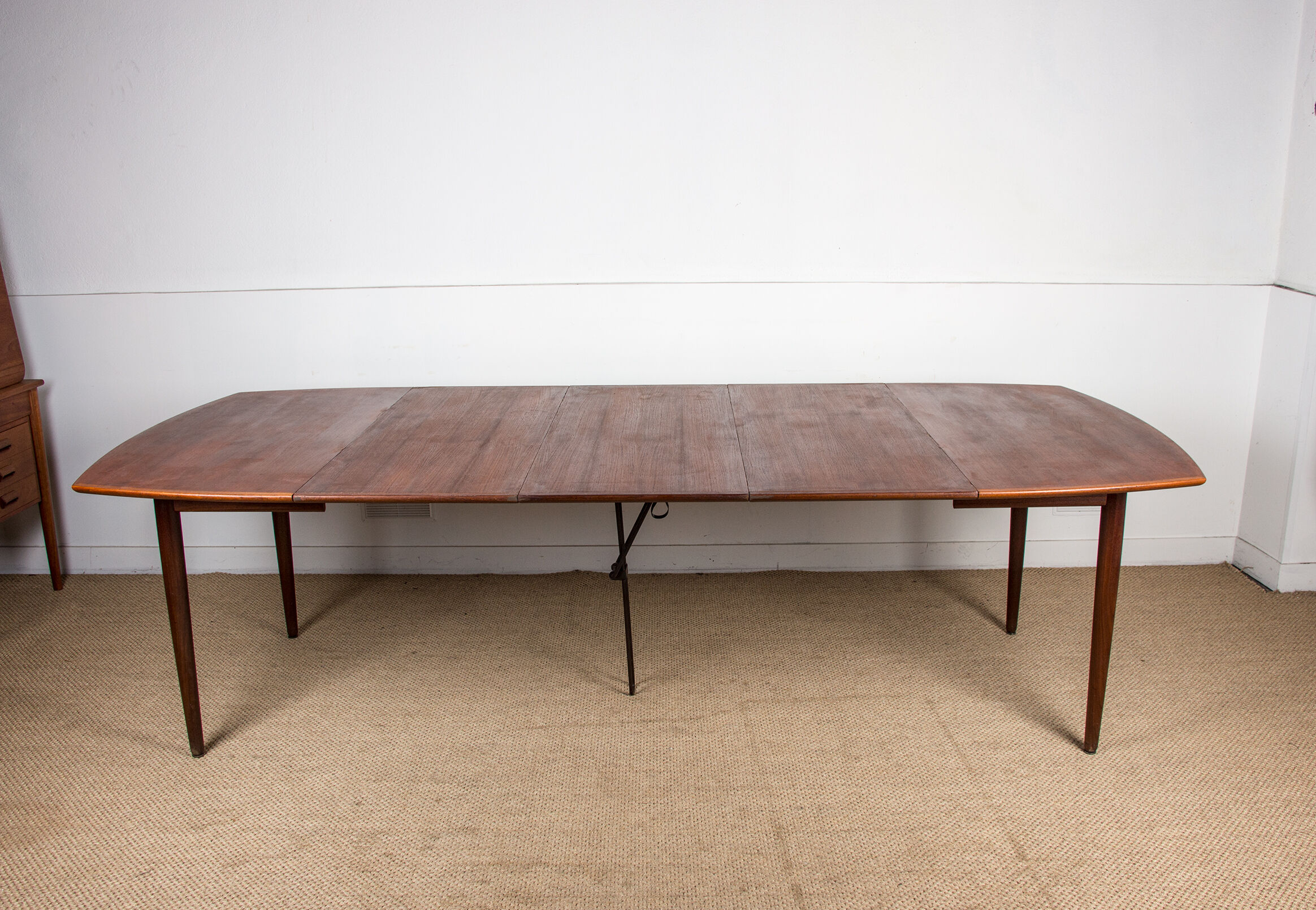 Expandable square teak dining table by Henry Walter Klein 1960