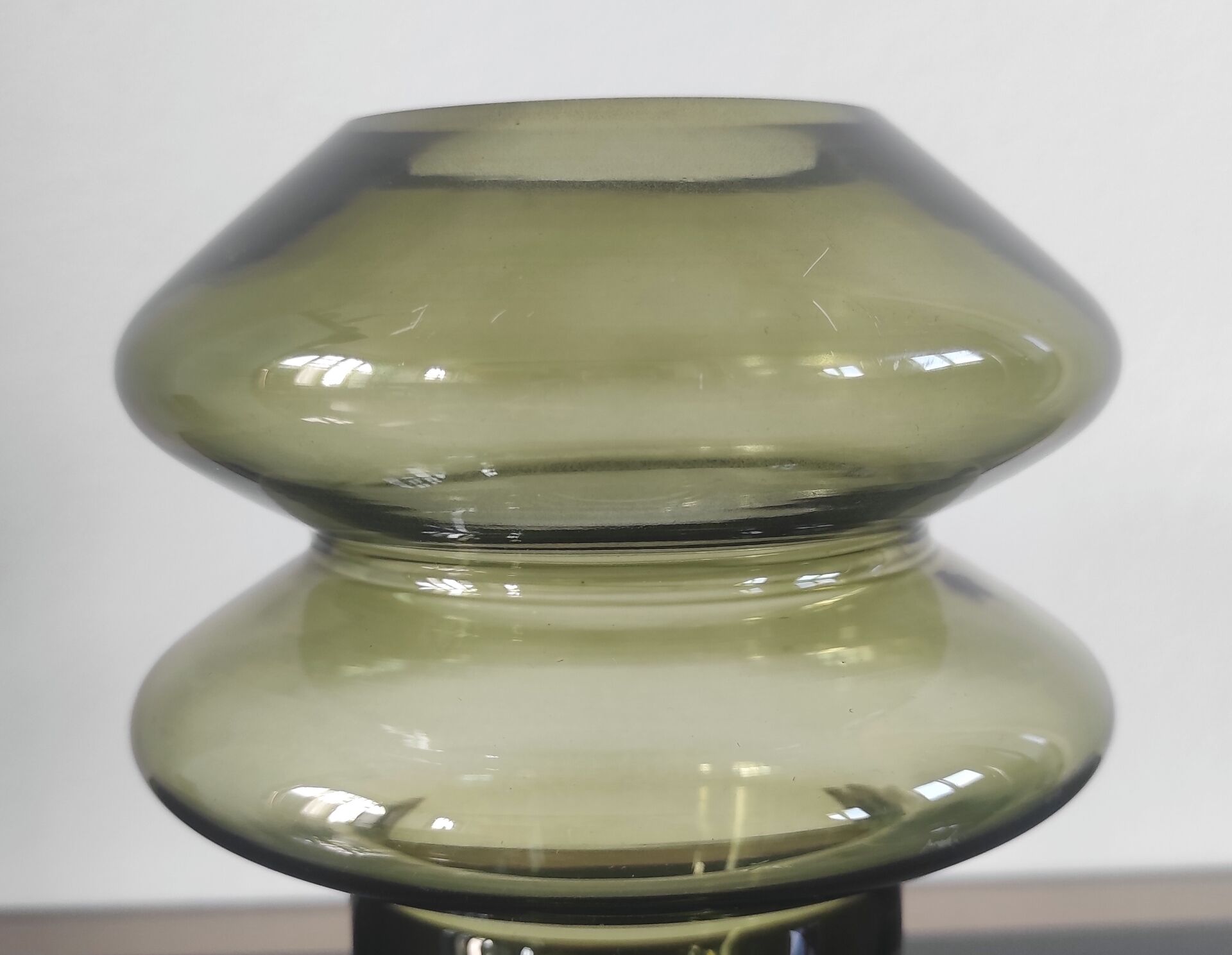 Sculptural vase in olive green glass