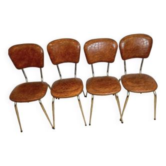 4 chaises en skaï brun et piétements métal chromé années 60