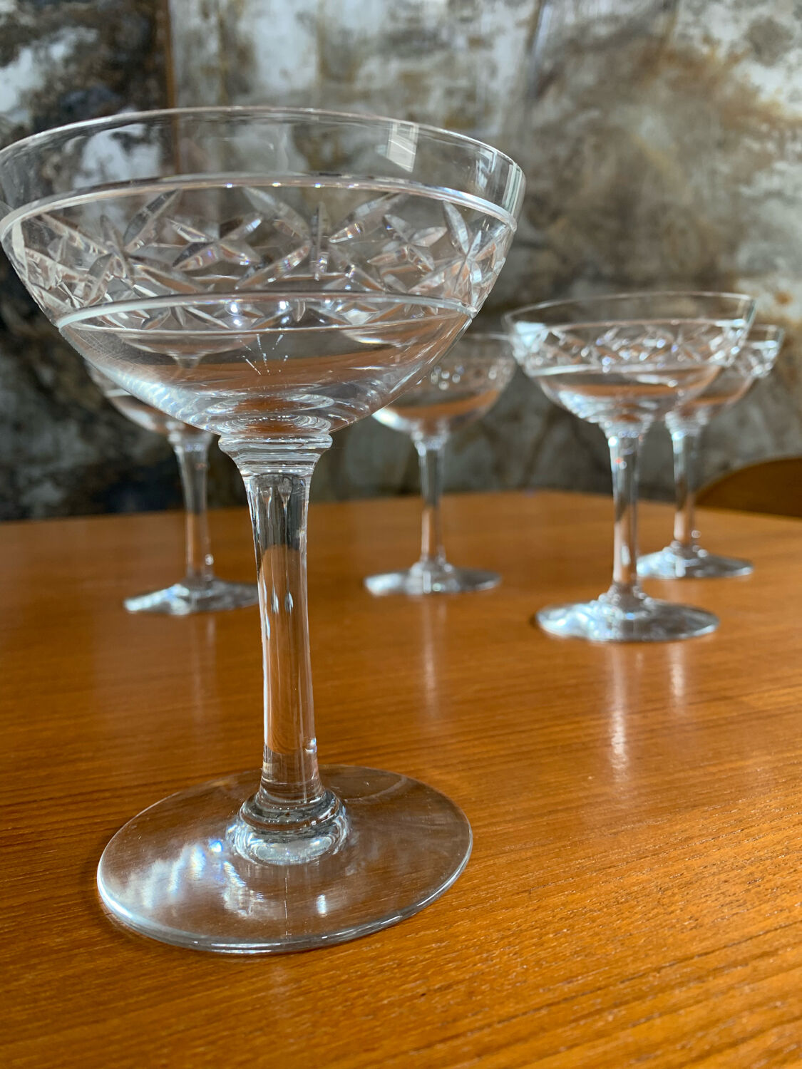 5 old champagne glasses
