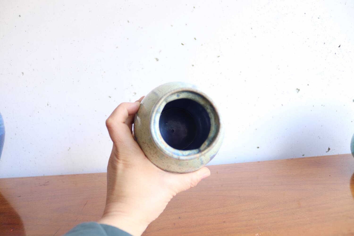 Small vase in glazed blue stoneware.