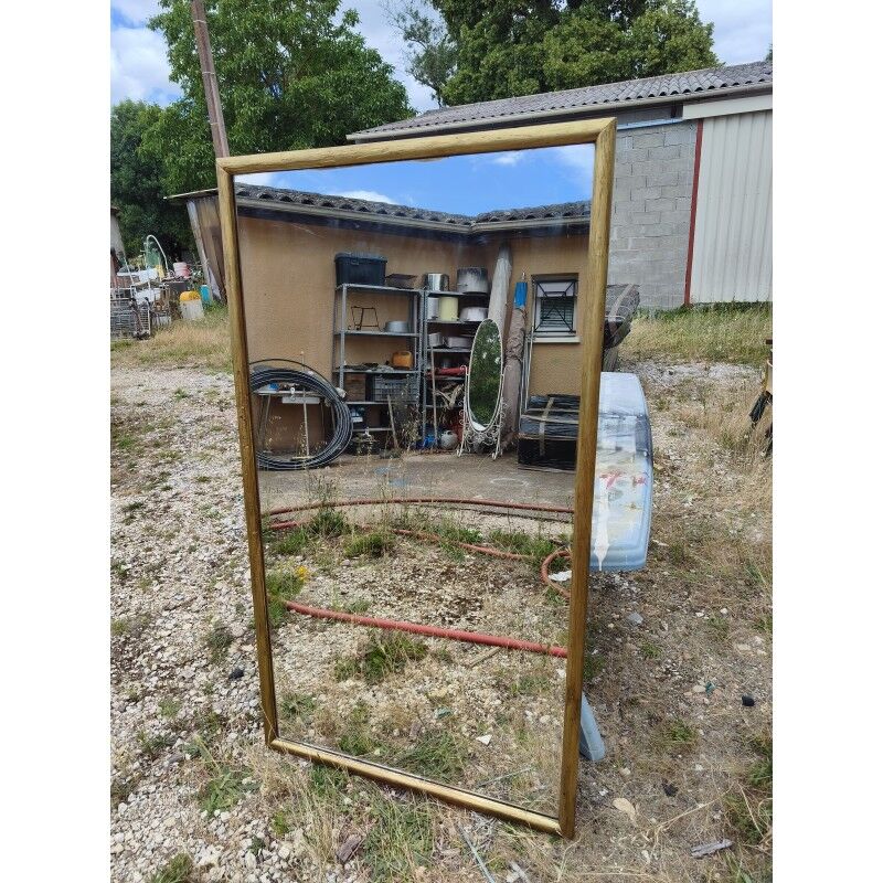 Large mirror from the early 20th century, wood and gilded stucco.