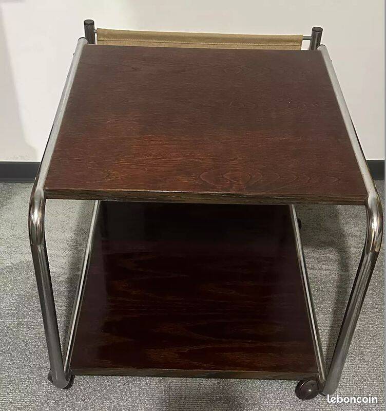 1970s/80s coffee table on casters with metal tubing, light-colored door
