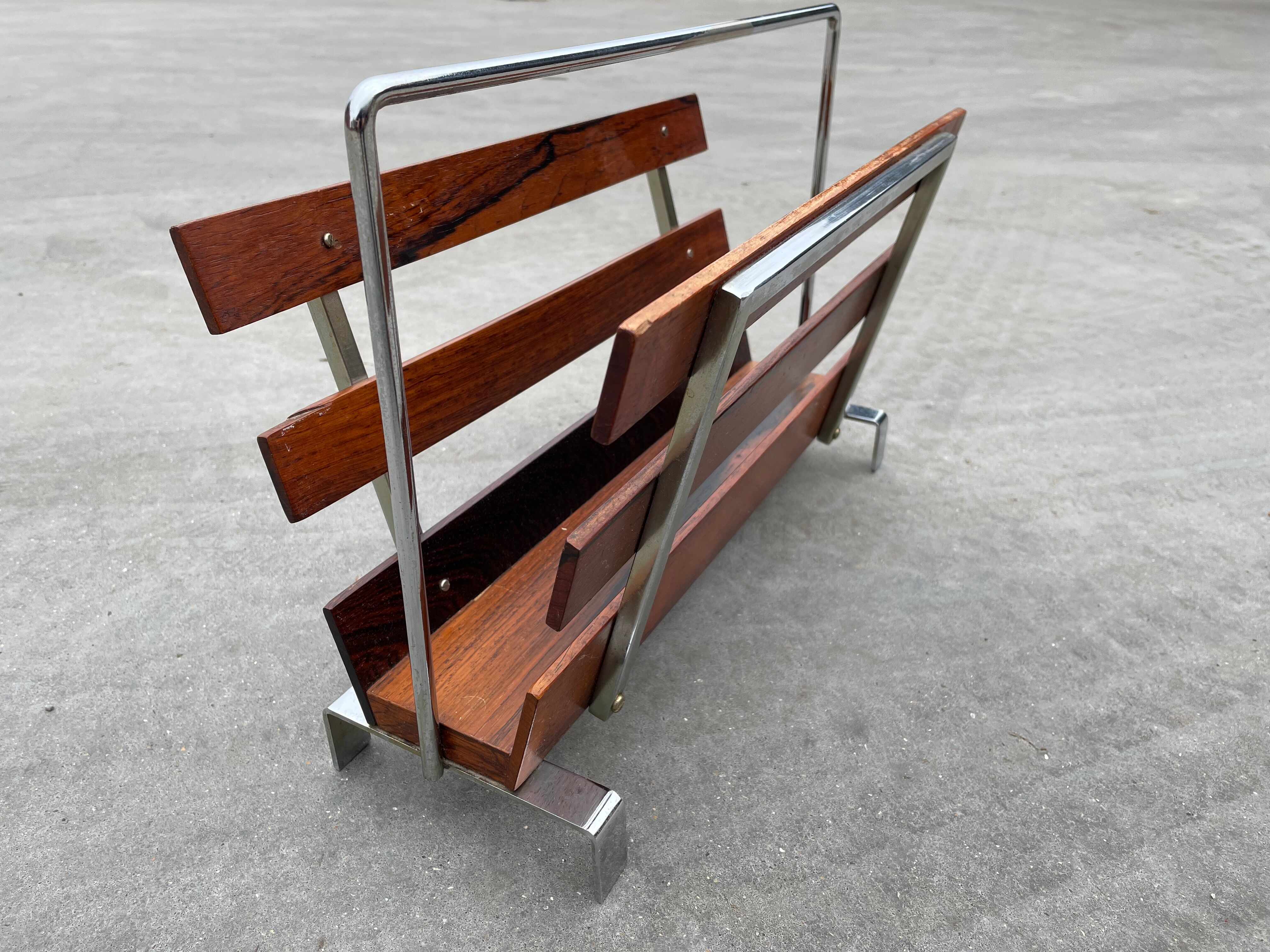 Vintage magazine rack from  rosewood and chrome design