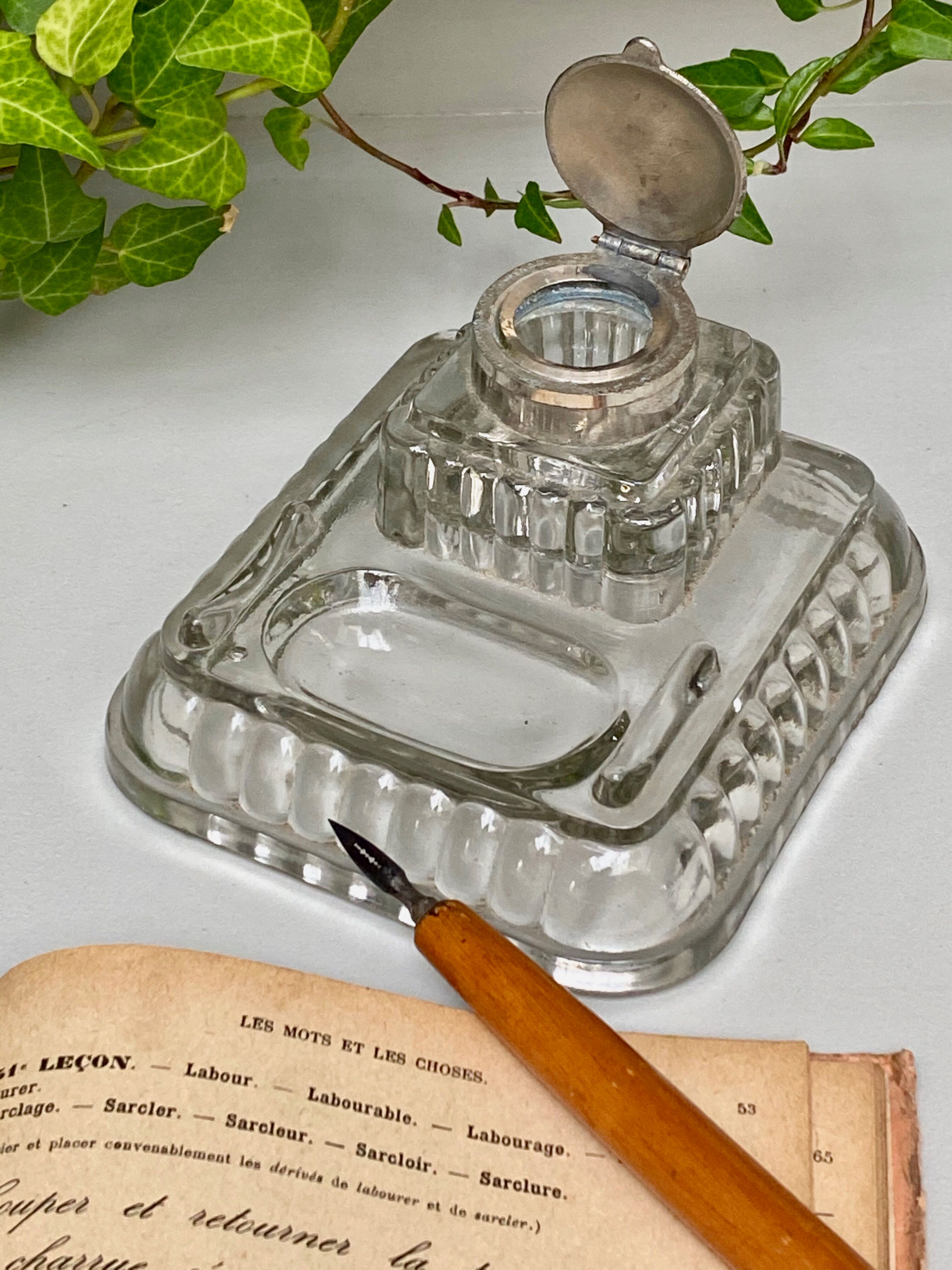 Old glass inkwell