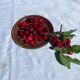 Small antique lacquered dish with hand-painted floral decoration.