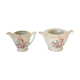 Sugar bowl and milk jar in flowery white porcelain