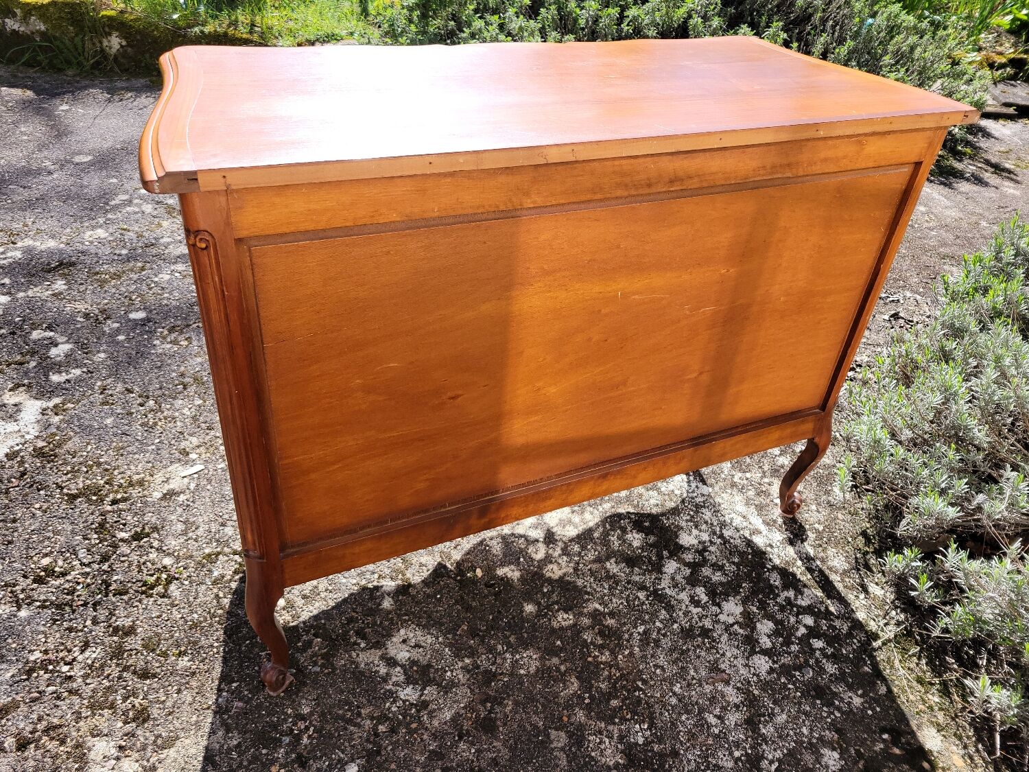 Louis XV style crossbow commode in cherry wood