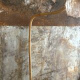 Rattan cradle with arrow
