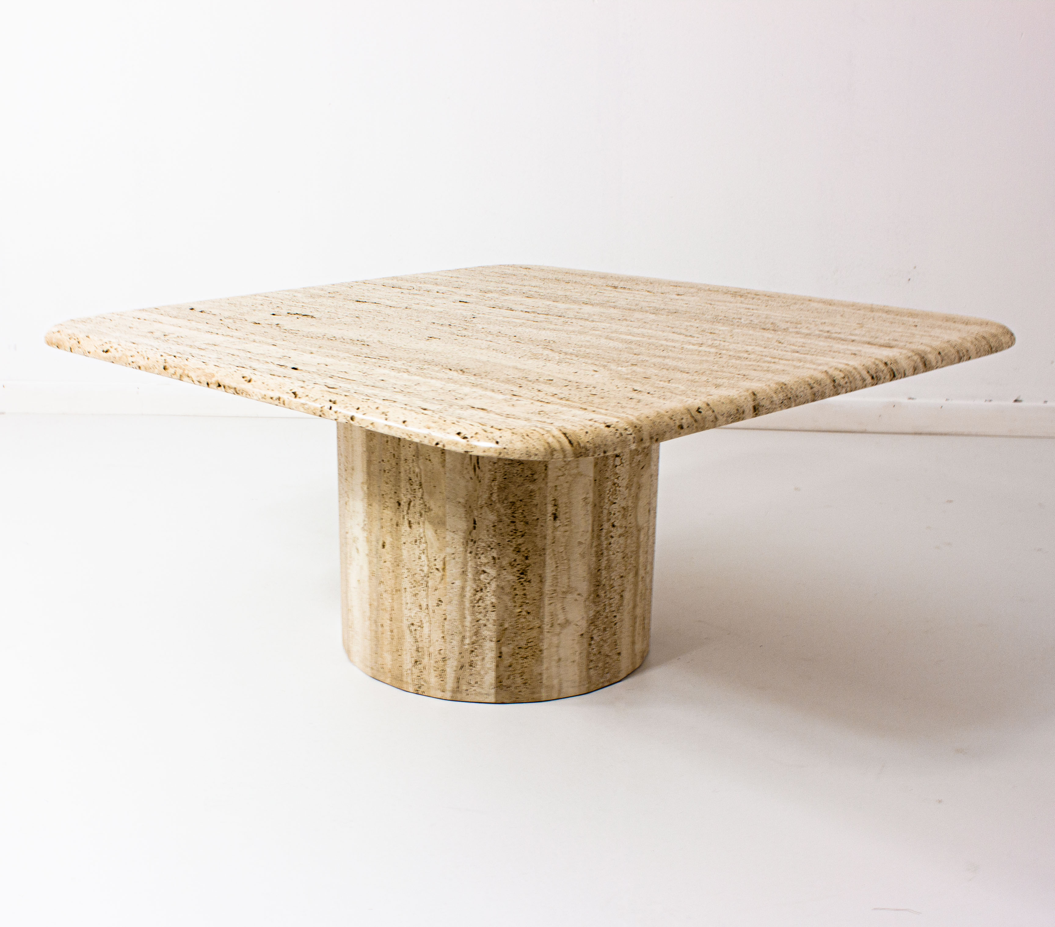 Square travertine coffee table